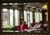  Arkansas Democrat-Gazette/WILLIAM MOORE
Courtney Montgomery-Burnett (R), her son Elliot, 1, and mom Cyndi Farnam, all of Fayetteville, are reflected in a mirror on the wall as they have lunch at the Restaurant on the Corner on the day it reopened after a January fire Monday, March 8, 2010 in Fayetteville.  It was Cyndi's birthday.