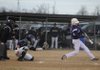 STAFF PHOTO SARAH BENTHAM Elkins’ Lee Holmes hits the ball in the second inning against Shiloh Christian on Monday in Springdale.