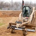 STAFF PHOTO DAVID FRANK DEMPSEY 
Bentonville Parks athletic field crew leader Chris Little uses the...
