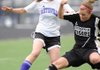 STAFF PHOTO ANDY SHUPE 
Fayetteville sophomore Melanie Lee, left, and Bentonville senior Rylea Wallace vie for the ball during the first half of play Monday at Harmon Field in Fayetteville.