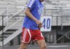STAFF PHOTO SARAH BENTHAM 
Rogers Heritage’s Phillip Amaya dribbles the ball during practice Monday in Rogers.
