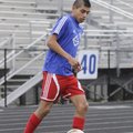 STAFF PHOTO SARAH BENTHAM 
Rogers Heritage’s Phillip Amaya dribbles the ball during practice Monday...
