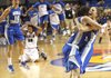  Middle Tennessee women's basketball team member Anne Marie Lanning, right, hugs Alysha Clark as teammate Jackie Pickel 