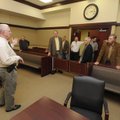 FIELD TRIP - Capt. Larry Burris, left, gives the Benton County justices of the peace a tour Tuesday ...