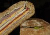 A pressed sandwich, sometimes called a brick sandwich, spends hours under a weight (like a brick or pizza stone) in the fridge. The layers — and flavors — meld, making it perfect for packing on a picnic.