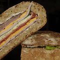 A pressed sandwich, sometimes called a brick sandwich, spends hours under a weight (like a brick or ...