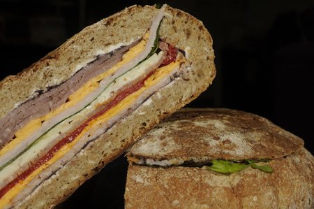 
                               
                                  Photo by J.T. Wampler&mdash;
                               
                           
                           A pressed sandwich, sometimes called a brick sandwich, spends hours under a weight (like a brick or pizza stone) in the fridge. The layers — and flavors — meld, making it perfect for packing on a picnic.