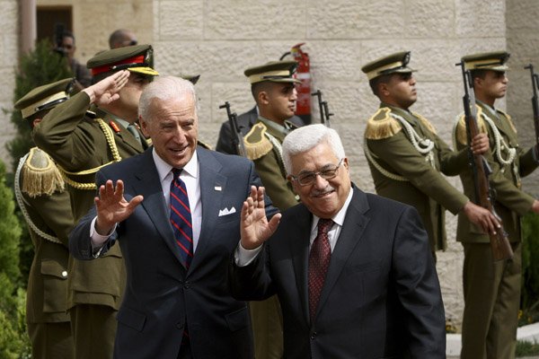 vice-president-joe-biden-left-and-palestinian-president-mahmoud-abbas-wave-to-the-press-ahead-of-their-meeting-in-the-west-bank-city-of-ramallah-wednesday