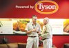 Tyson Foods CEO Donnie Smith, left, speaks with Don Tyson, right, at the Tyson Corporate office in Springdale Thursday March 4, 2010. 
