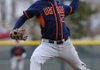 Rogers Heritage starter Travis Entwisle delivers a pitch during the War Eagles’ benefit game March 2 against Greenwood at Veterans Park in Rogers.