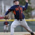 Rogers Heritage starter Travis Entwisle delivers a pitch during the War Eagles’ benefit game March 2...