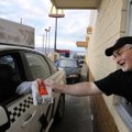 MCTEACHER NIGHT - Greg Sandlin, right, a seventh-grade English and reading teacher at Oakdale Middle...