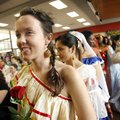  
Wearing a traditional Bolivian dress, Erin Killeen, stands in line with other models Wednesday fo...