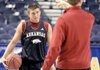    Arkansas player Rotnei Clarke listens to coach John Pelphry during practice Wednesday afternoon at the Southeastern Conference tournament in Nashville, Tenn. 