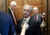  Sen. Bob Corker, R-Tenn., center, talks to a reporter on Capitol Hill in Washington, Wednesday, March 10, 2010, prior to boarding a elevator with Sen. Jim Bunning, R-Ky., left, and  Sen. Jim Risch, R-Idaho, second from right. 