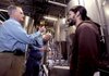 Ben Van Patten (left) and Doug Wood check out a glass of beer poured Friday by brew master Jesse Melton (right) at the Diamond Bear Brewery in Little Rock.