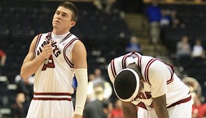 Arkansas' Rotnei Clarke (left) and Stefan Welsh in the closing seconds of their 77-64 loss to Georgia at the Southeastern Conference tournament in Nashville.