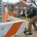  Joe Beckford, right, and Paul Minnitti, both with Electrical Resources of Centerton, prepare to mov...