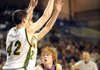 Bay’s Devin Griffin (right) is double-teamed by Wonderview’s John Zimmerman (42) and Brandon Burgener during Friday’s Class 1A boys championship game.