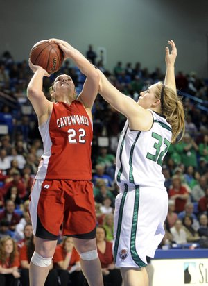 Cave City’s Haley Bell (left) is fouled by Valley Springs’ Arielle Sanders during Friday’s Class 3A girls championship game.