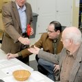 Benton County election commissioners Bill Williams, from left, Tim Hutchinson and E.J. Miller draw n...
