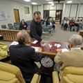 Jim Reavis, chairman of the Washington County Republican Party, draws a ballot position for an absen...