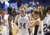 Fayetteville players react after the Lady Bulldogs dropped a 51-46 decision in double overtime to North Little Rock in the Class 7A State Championship Game on Friday in Summit Arena in Hot Springs.