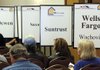 Homeowners wait Thursday to meet with housing counselors and representatives from major lenders in Glendale, Ariz., at an event organized under the Making Home Affordable program.