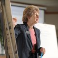 Alice Mann, senior consultant with the Alban Institute, speaks Monday during a workshop at the Small...
