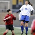 Rogers High’s Natalie Breach heads the ball over Springdale High’s Shirley Izaguirre during the firs...
