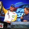 Angler Ray Scheide of Dover, AR holds up the last fish in his limit during the final weigh-in for th...
