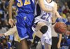 Fayetteville guard Sierra Shipley, right, loses control of the ball as North Little Rock’s Lexus Williams defends during the first half of Friday’s Class 7A State Championship game Friday in Summit Arena in Hot Springs.