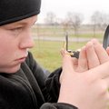Kelly Lange, 13, takes a compass bearing for one leg of a complicated one-mile course around Memoria...