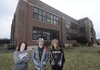 GED students, from left, Amanda McAnally, Steven Poplin II and Seth Adams stand in front of the Adult Education Center in Fayetteville on Friday.