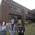 GED students, from left, Amanda McAnally, Steven Poplin II and Seth Adams stand in front of the Adul...