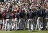  Players rush onto the field during an altercation between Arizona Diamondbacks catcher Chris Snyder and Seattle Mariners pitcher Cliff Lee during Monday’s game. Lee (Benton, Arkansas Razorbacks) was ejected from the game after throwing at Snyder. “I was trying to go inside and a couple got away from me, and the guy hitting got mad and came close to the plate and I got thrown out in the process,” Lee said.