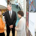Peaches Coleman, left, and Krista Khone talk with the new director of Crystal Bridges Museum of Amer...