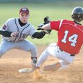 Gentry shortstop Cody Stewart, left, reaches to apply the late tag as Farmington’s Spencer Boudrey s...