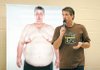 Danny Cahill, who lost 239 pounds to win the eighth season of “The Biggest Loser,” speaks Monday to Sugar Creek Elementary School students. Cahill encouraged the students to set difficult goals for themselves and to work hard to achieve those goals.