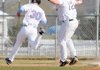 After tagging a Fort Smith Southside runner out, Bentonville first baseman Arthur Flowers throws to second during Tuesday’s game in Bentonville.