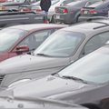 Blake Ceola walks away from his car Tuesday in a free parking lot off of Dickson Street. Ceola is a ...