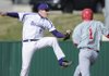 Fayetteville’s Clarke Smithson tags Fort Smith Northside’s Blake Brodie out at first base during 7A-West Conference action Tuesday in Fayetteville.