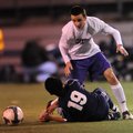Fayetteville’s Austin Murders looks to gain possession of the ball after colliding with Springdale H...
