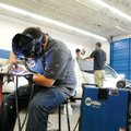 Austin Lowery, a senior at Har-Ber High School, practices spot welding Tuesday during Northwest Tech...