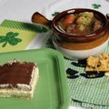 Helpings of three potluck selections are shown: Eclair Cake, Hearty Irish Beef Stew and Neiman-Marcu...