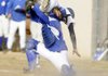 Rogers High catcher Jake Rylee tags Har-Ber’s Brandon Jansen out at home in the sixth inning of the Wildcats’ 2-0 win Tuesday at Tyson Sports Complex in Springdale.