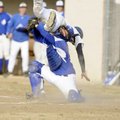 Rogers High catcher Jake Rylee tags Har-Ber’s Brandon Jansen out at home in the sixth inning of the ...