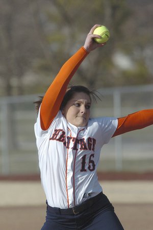 Jessica Vazquez delivers a pitch during Tuesday’s game for Rogers Heritage against Bentonville. 