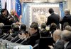 OPEC and Austrian officials applaud Wednesday in Vienna during a ceremony officially opening the organization’s new headquarters and celebrating the organization’s 50th anniversary.