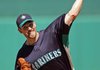  Seattle Mariners' pitcher Cliff Lee delivers against the Arizona Diamondbacks during a spring baseball game at Tucson Electric Park on  Monday